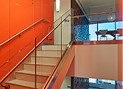 clear low-iron glass used as a stair railing