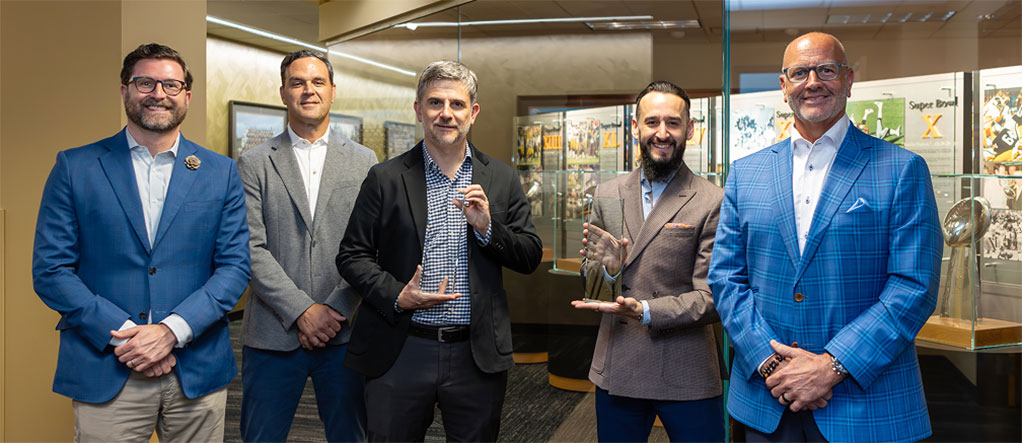 From Left to Right: A.J. Poole (Steelers Director of Partnership Sales and Activation); Ryan Huzjak (Steelers Senior Vice President of Business Operations); Ricardo Maiz (Vitro Architectural Glass President); Fernando Diez (Vitro Architectural Glass Vice President of Marketing, Innovation & New Business Development); Mark Seeton (Vitro Architectural Glass Vice President of Sales)